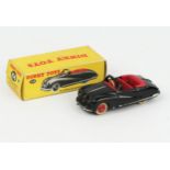 A Dinky Toys 106 Austin Atlantic Convertible in black with red interior, red hubs and white tyres in