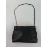 A Valentino Black Leather Handbag in shopping branded shopping bag and other accessories