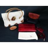 Three Handbags / Wallets including eel skin in dust jacket, cow hide bag, and faux crocodile skin