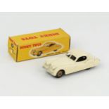 A Dinky Toys 157 Jaguar XK120 Coupe in white with fawn hubs in correct type 1 yellow white sticker