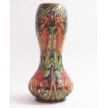 A modern Moorcroft vase, 'Flame of the Forrest' 29cm high.