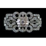 Art Deco Diamond Brooch set with round and baguette cut stones in an unmarked platinum? setting,
