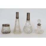 Four silver and glass dressing table bottle, (4). stoppers missing, marks worn.