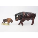 A large pottery model of a bull 3930, together with a small model of a West German model of a