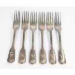 A set of six Victorian table forks, Fiddle and Thread, engraved crest of Pegues holding a sprig,