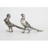 A pair of cast silver miniature pheasants, cock and hen, 8cm long, 60grams.
