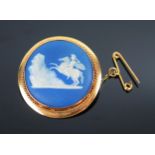Wedgwood Jasper Ware Brooch decorated with a Roman soldier on a rearing horse and in an unmarked