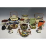 Torquay Pottery, Motto ware, three biscuit barrels, three cats, a bowl, various other items, (17).