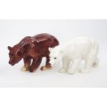 A large 20th Century pottery polar bear and a large pottery brown bear, (2).