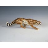 A 20th Century Italian pottery model of a prowling Leopard, 1530/2 incised R, 40cm long.