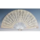 A late 19th Century Mother of Pearl and lace fan, pieced and gilded scales, boxed, J. Duvelleroy,