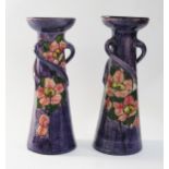 A pair of Arts and Crafts West Country vases, of inverted tapering form, with three handles,