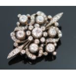 Antique Diamond Brooch set with old cut stones and in an unmarked high carat rose gold and white