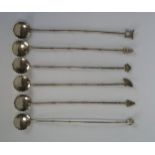 Set of Six Oriental White Metal Long Stemmed Spoons with pagoda, fan, Buddha and other finials, 43.