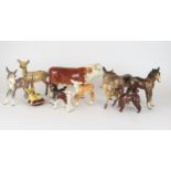 A Selection of Beswick including a chihuahua, a poodle, a Herford bull, a donkey and foal, a calf, a