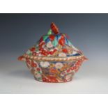 A large Imari design porcelain tureen and cover, 30cm high.