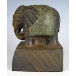 An India cast iron figure of an elephant on a plinth base, 12x8.5x7.5cm.