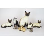 A collection of Beswick Siamese cats, comprising of 2x 1559,1882,1030,1887,1296 and two mice