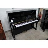 Essex (c2010) A Model EUP123 upright piano in a bright ebonised case. There is VAT on this Lot.