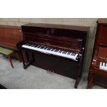 Kawai (c2014) A Model K-200 upright piano in a bright mahogany case; together with a stool.