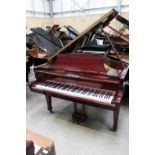 Kawai (c2002) A 5ft 5in Model RX-1A grand piano in a bright mahogany case; together with a duet