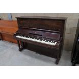 Steinway (c1937) A Model V upright piano in a mahogany case.