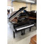 Steinway (c1971) A 6ft 11in Model B grand piano in an ebonised case on square tapered legs.