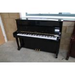 Boston (c2002) A Model UP-118E upright piano in a bright ebonised case; together with a matching