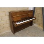 Steinway (c1963) A Model Z upright piano in a modern style satin mahogany case.