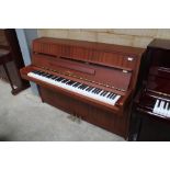 Yamaha (c1980) A Model M5J upright piano in a satin mahogany case; together with a stool.