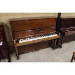 Steinway (c1963) A Model V upright piano in a bright mahogany case; together with a stool. This