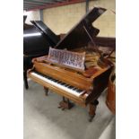 Bechstein (c1908) A 6ft 7in Model B grand piano in a rosewood case on turned octagonal legs.