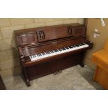 Yamaha (c1980) A Model L101 upright piano in a satin mahogany case. There is VAT on this Lot.
