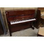 Petrof (c1996) An upright piano in a traditional bright mahogany case, together with a matching