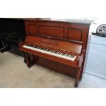 Steinway (c1929) A Model K upright piano in a rosewood case.