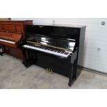 Essex (c2008) A Model EUP123 upright piano in a bright ebonised case. There is VAT on this Lot.