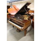 Steinway (c1905) A 6ft 11in 88-note Model B grand piano in a rosewood case on square tapered legs.
