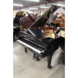 Steinway (c2001) A 5ft 10in Model O grand piano in a bright ebonised case on square tapered legs.