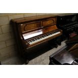 Steinway (c1896) An upright piano in a rosewood case inlaid with trailing foliate panels; together