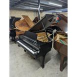 Steinway (c1978) A 6ft New York Model L grand piano in a satin ebonised case on square tapered legs.