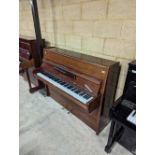 Blüthner (c1967) A Model M upright piano in a modern style bright mahogany case.