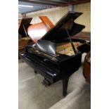 Yamaha (c1976) A 7ft 6in Model C7 grand piano in a bright ebonised case on square tapered legs.