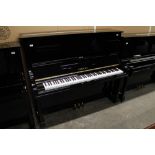 Yamaha (c1979) A Model U3H upright piano in a bright ebonised case. There is VAT on this Lot.