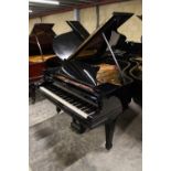 Steinway (c1927) A 6ft 2in Model A grand piano in a bright ebonised case on square tapered legs;