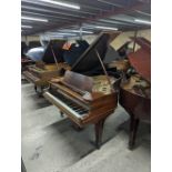 Steinway (c1910s) A 5ft 7in Model M grand piano in a rosewood case on square tapered legs;