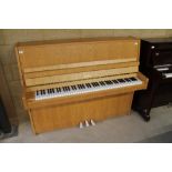 Petrof (c2000) A 115cm upright piano in a modern style light oak case.