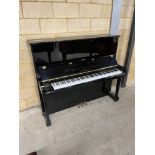 Yamaha (c2001) A Model SU131 traditional upright in a bright ebonsied case; together with a matching