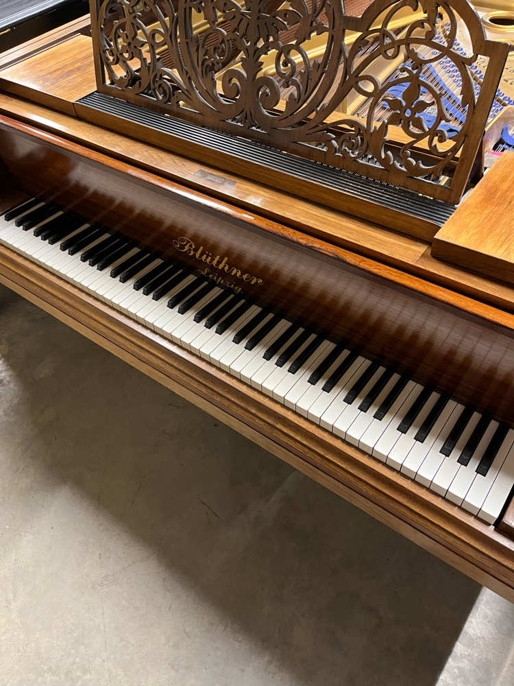 Blüthner (c1897) A 6ft 11in grand piano in a rosewood case on turned and fluted legs. - Image 2 of 10