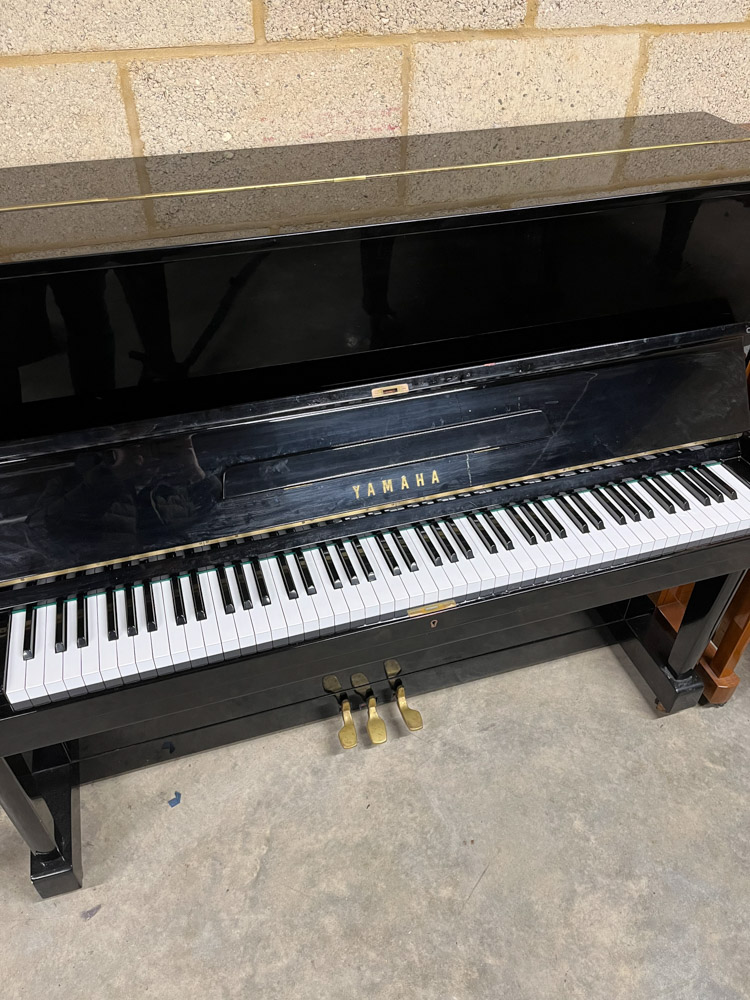 Yamaha (c1961) A Model U1E upright piano in a traditional bright ebonised case; together with an - Image 2 of 5