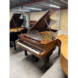 Steinway (1883) A 7ft 3½in 85-note Model C grand piano in rosewood case on turned tapered legs.